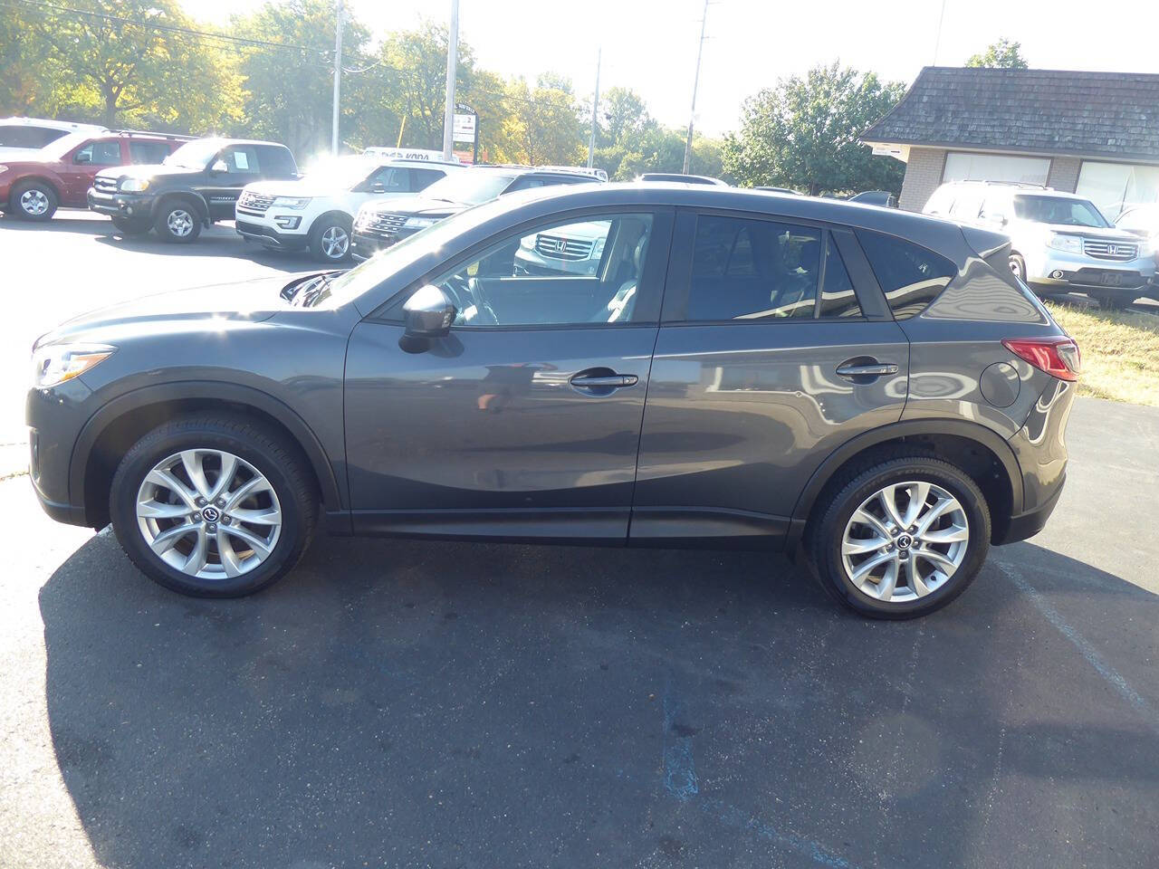 2014 Mazda CX-5 for sale at Lakeshore Autos in Holland, MI