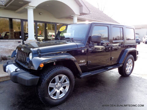 2014 Jeep Wrangler Unlimited for sale at DEALS UNLIMITED INC in Portage MI