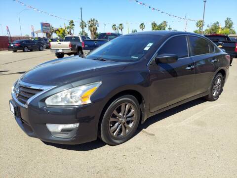 2015 Nissan Altima for sale at Credit World Auto Sales in Fresno CA