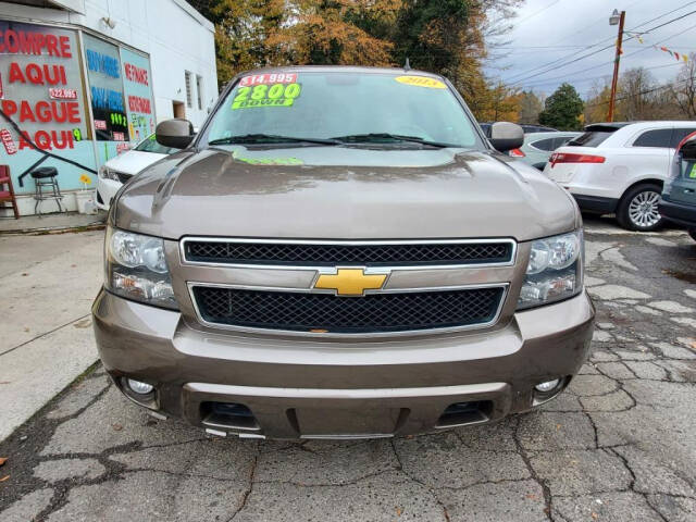 2013 Chevrolet Suburban for sale at DAGO'S AUTO SALES LLC in Dalton, GA