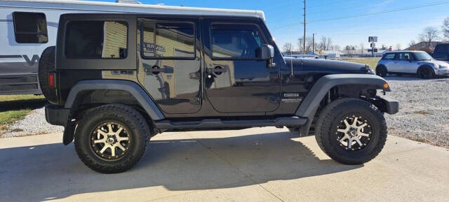 2014 Jeep Wrangler Unlimited for sale at CORNMAN AUTO LLC in Kirksville, MO