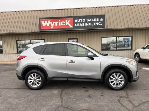 2014 Mazda CX-5 for sale at Wyrick Auto Sales & Leasing-Holland in Holland MI