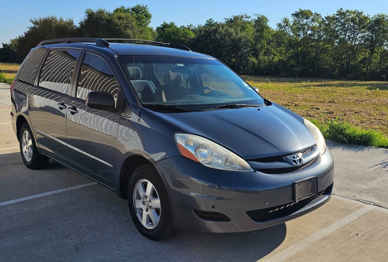 2006 Toyota Sienna for sale at CAR MARKET AUTO GROUP in Sugar Land, TX