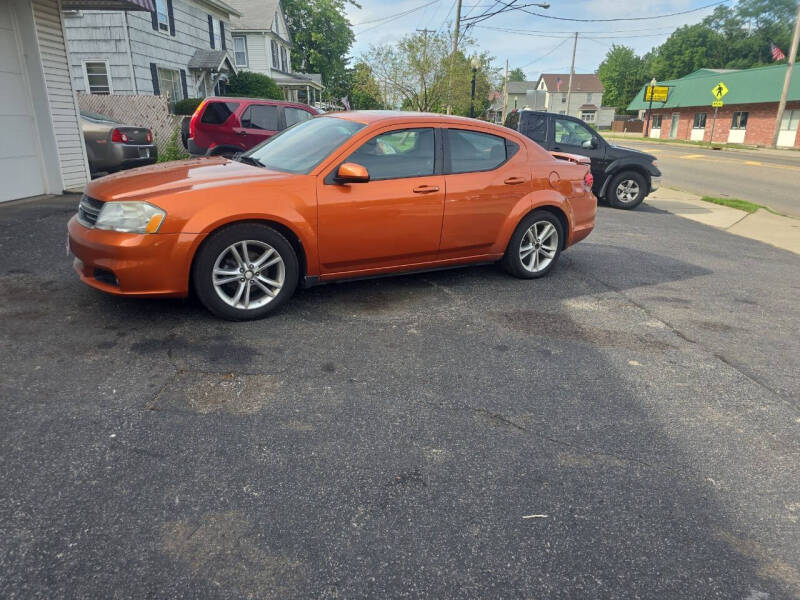 2011 Dodge Avenger for sale at Maximum Auto Group II INC in Cortland OH