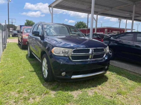 2013 Dodge Durango for sale at CE Auto Sales in Baytown TX