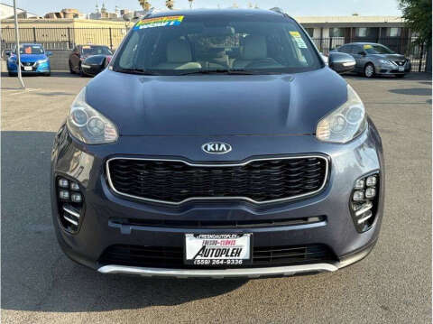 2019 Kia Sportage for sale at Armando Auto Sales in Fresno CA