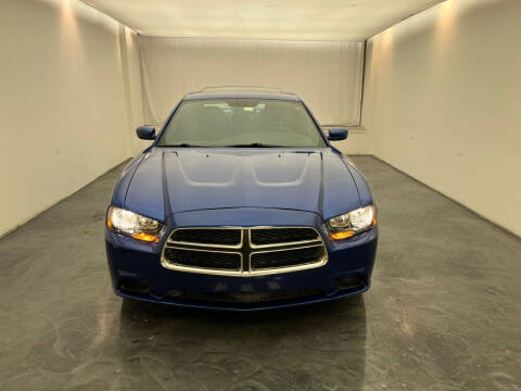 2012 Dodge Charger for sale at Roman's Auto Sales in Warren MI