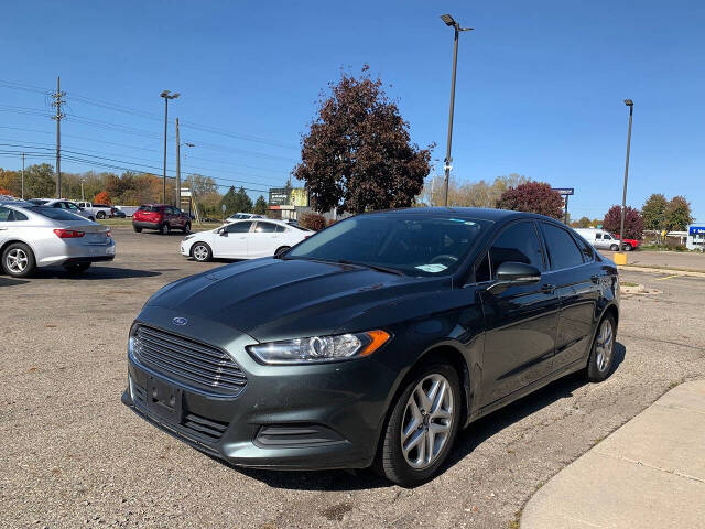 2016 Ford Fusion for sale at Cars On Demand LLC in Lansing, MI