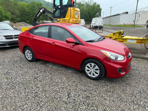 2015 Hyundai Accent for sale at SAVORS AUTO CONNECTION LLC in East Liverpool OH