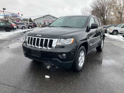 2011 Jeep Grand Cherokee for sale at Steves Auto Sales in Cambridge MN