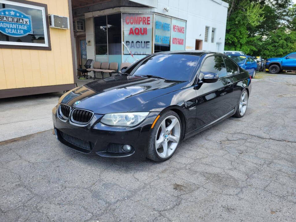 2011 BMW 3 Series for sale at DAGO'S AUTO SALES LLC in Dalton, GA