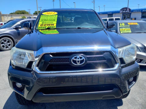 2013 Toyota Tacoma for sale at JAH MOTORSPORT CORP OF FLORIDA in Cocoa FL