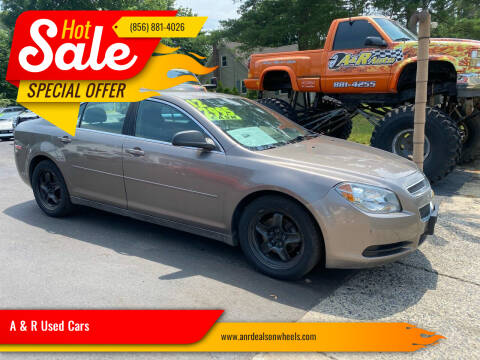 2012 Chevrolet Malibu for sale at A & R Used Cars in Clayton NJ