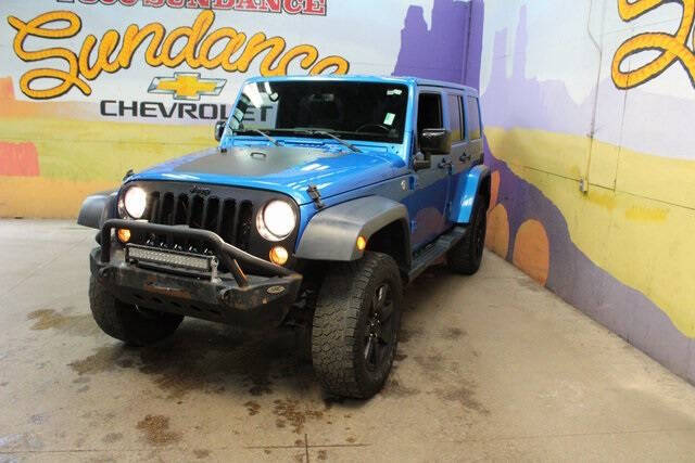 Used 2014 Jeep Wrangler Unlimited Sahara with VIN 1C4BJWEGXEL267411 for sale in Grand Ledge, MI