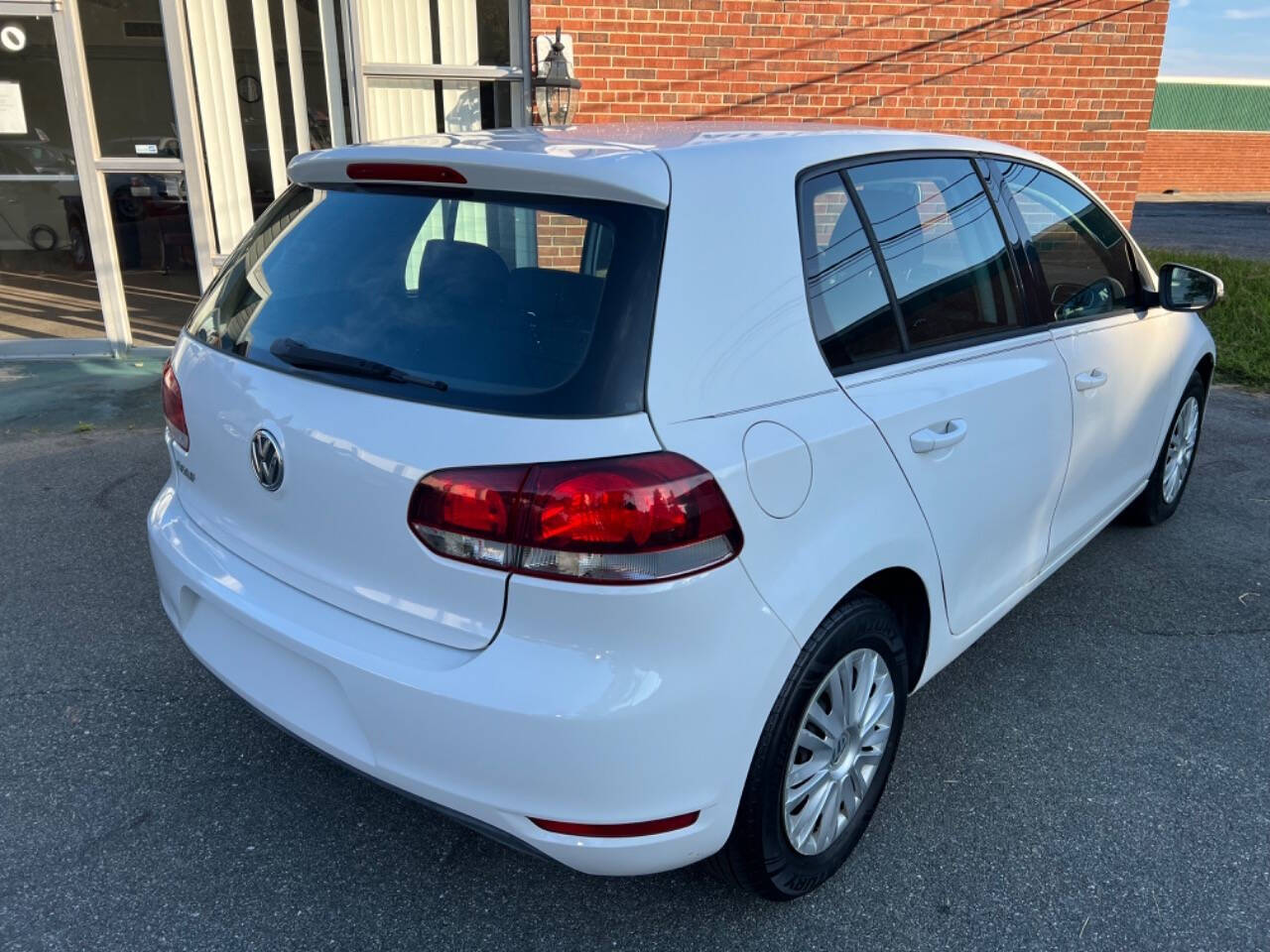 2011 Volkswagen Golf for sale at Universal Auto Sales LLC in Burlington, NC