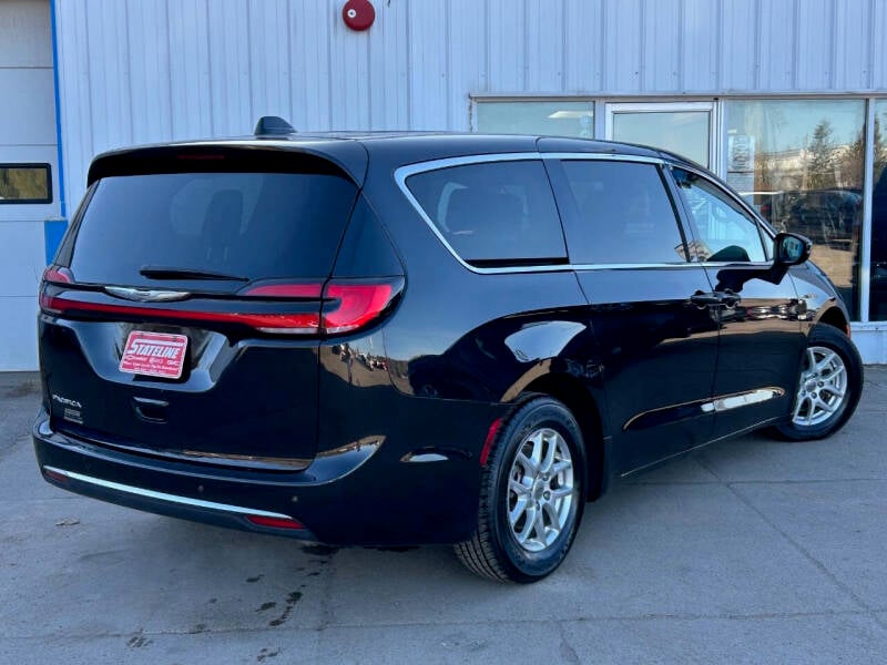 Used 2023 Chrysler Pacifica Touring L with VIN 2C4RC1BG9PR521622 for sale in Iron River, MI