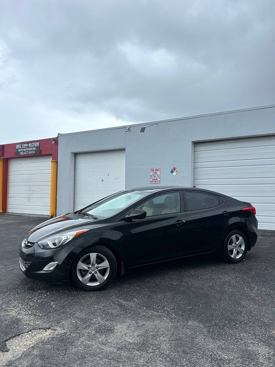 2013 Hyundai ELANTRA for sale at ALPHA AUTOMOTIVE SALES in Oakland Park, FL