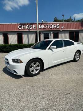 2013 Dodge Charger for sale at Chase Motors Inc in Stafford TX