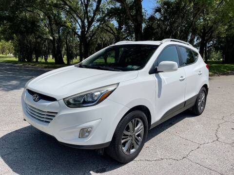 2015 Hyundai Tucson for sale at ROADHOUSE AUTO SALES INC. in Tampa FL