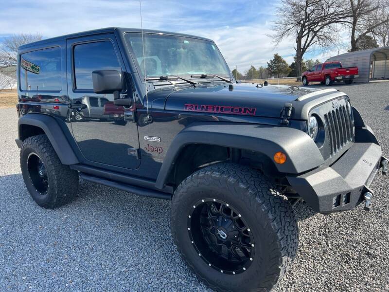 2016 Jeep Wrangler for sale at RAYMOND TAYLOR AUTO SALES in Fort Gibson OK