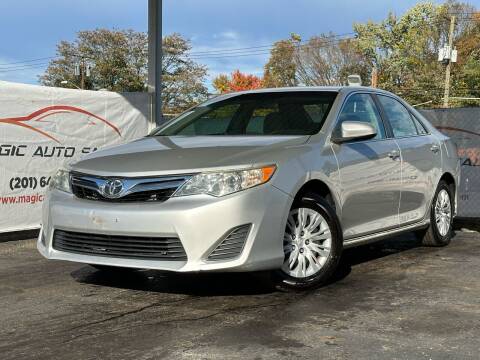 2014 Toyota Camry for sale at MAGIC AUTO SALES in Little Ferry NJ