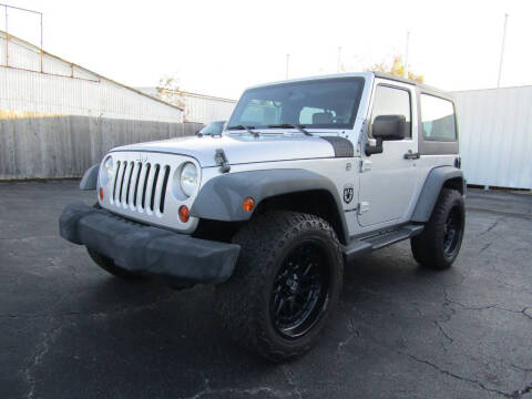 2009 Jeep Wrangler for sale at AJA AUTO SALES INC in South Houston TX