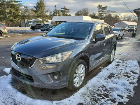 2014 Mazda CX-5 for sale at Topham Automotive Inc. in Middleboro MA