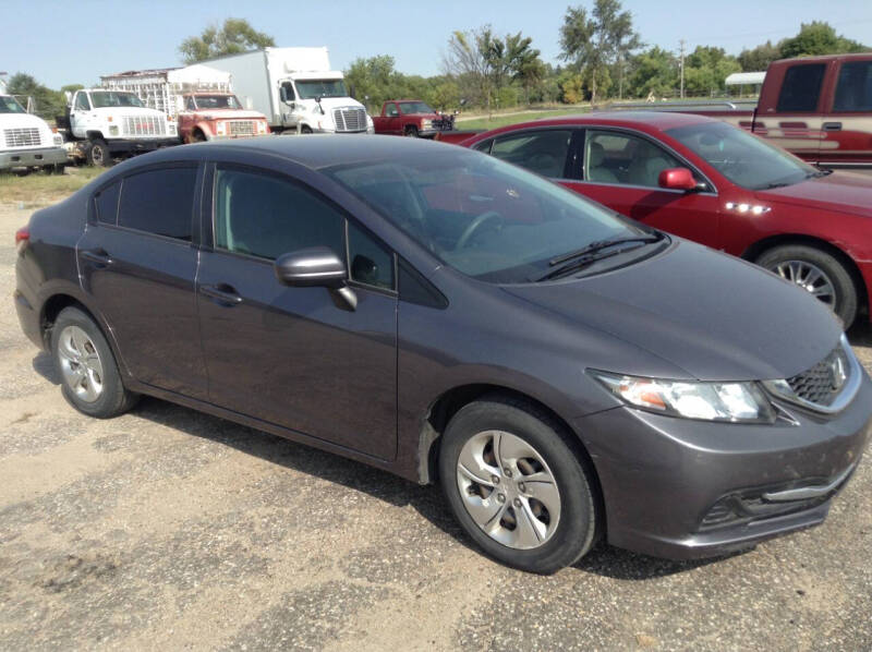 Used 2014 Honda Civic LX with VIN 19XFB2F57EE009134 for sale in Belleville, KS