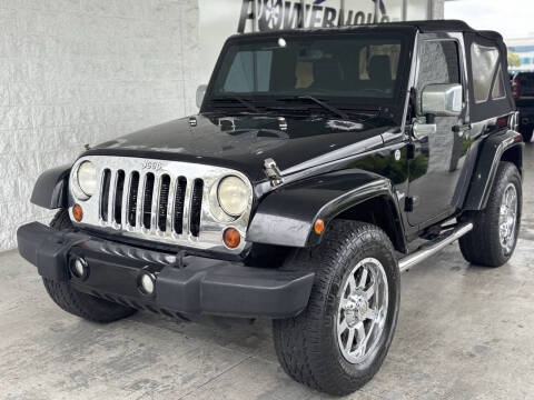 2013 Jeep Wrangler for sale at Powerhouse Automotive in Tampa FL