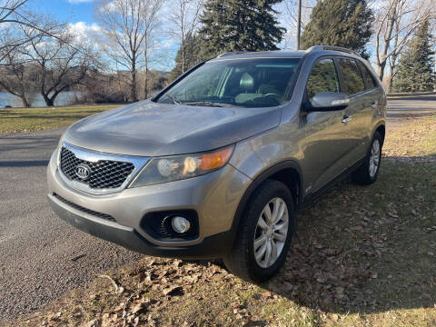 2011 Kia Sorento for sale at BELOW BOOK AUTO SALES in Idaho Falls ID