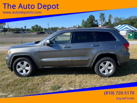 2011 Jeep Grand Cherokee for sale at The Auto Depot in Mount Morris MI