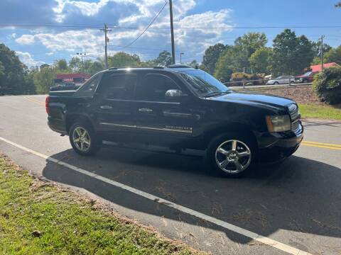 2009 Chevrolet Avalanche for sale at THE AUTO FINDERS in Durham NC