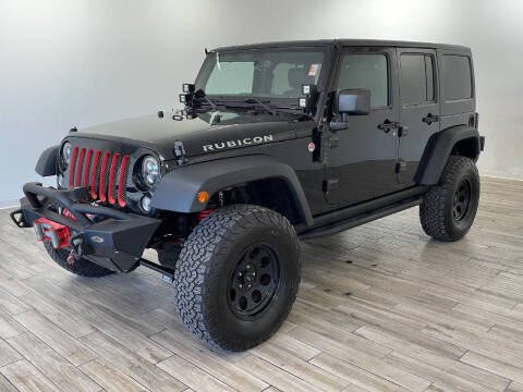 2015 Jeep Wrangler Unlimited for sale at TRAVERS GMT AUTO SALES - Autos para ti in Florissant MO