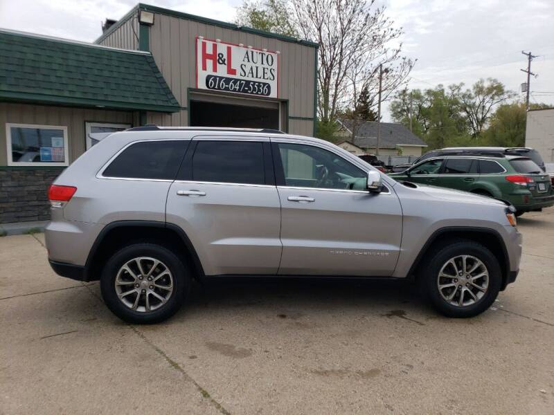2014 Jeep Grand Cherokee for sale at H & L AUTO SALES LLC in Wyoming MI