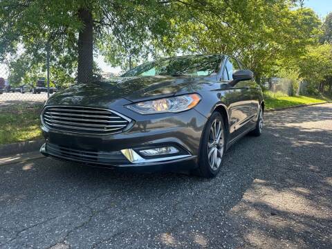 2017 Ford Fusion Hybrid for sale at Triple A's Motors in Greensboro NC