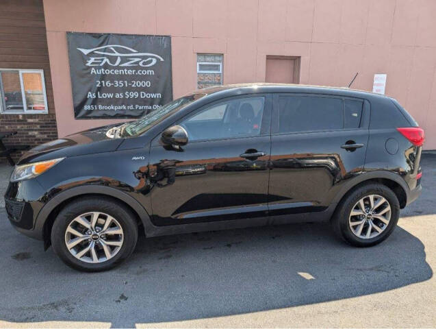 2014 Kia Sportage for sale at ENZO AUTO in Parma, OH