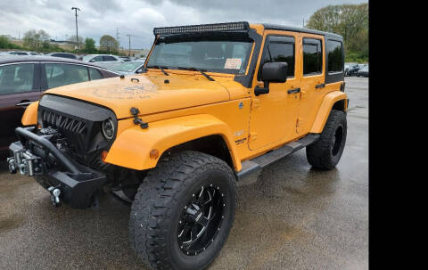 2012 Jeep Wrangler Unlimited for sale at GOLDEN RULE AUTO in Newark OH