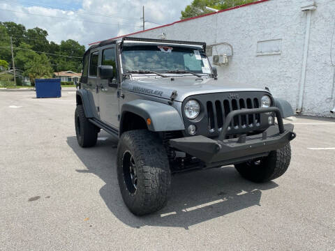2016 Jeep Wrangler Unlimited for sale at Consumer Auto Credit in Tampa FL