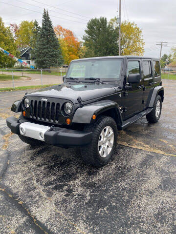 2013 Jeep Wrangler Unlimited for sale at SVS Motors in Mount Morris MI