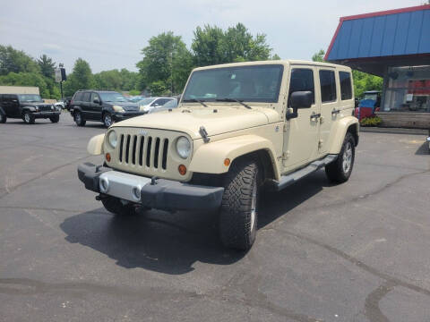 2011 Jeep Wrangler Unlimited for sale at Cruisin' Auto Sales in Madison IN