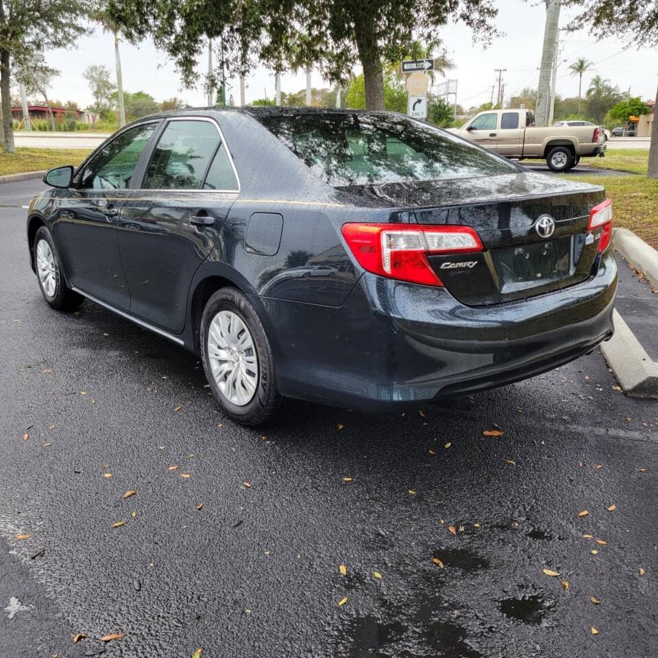 2014 Toyota Camry for sale at VERO APEX in Vero Beach, FL