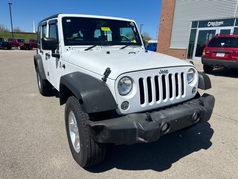 2015 Jeep Wrangler Unlimited for sale at Postal Pete in Galena IL