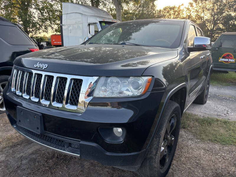 2013 Jeep Grand Cherokee for sale at Memo's Auto Sales in Houston TX