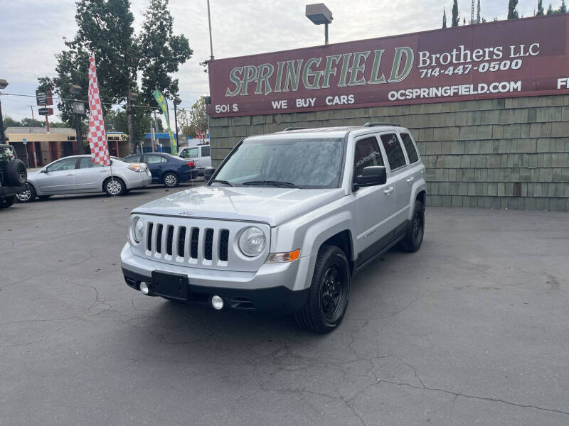 2013 Jeep Patriot for sale at SPRINGFIELD BROTHERS LLC in Fullerton CA