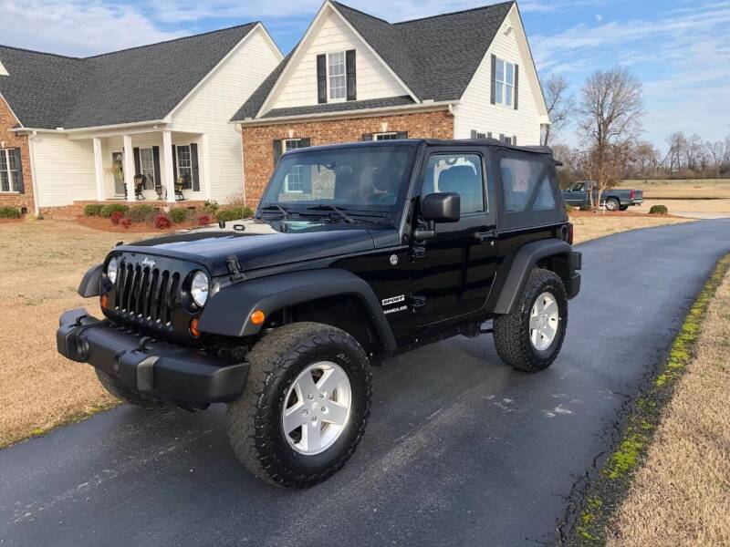 2012 Jeep Wrangler for sale at Performance Auto Center Inc in Benson NC