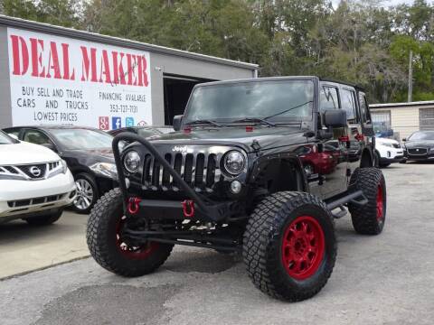 2014 Jeep Wrangler Unlimited for sale at Deal Maker of Gainesville in Gainesville FL