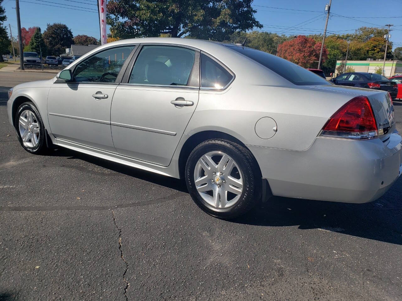 2011 Chevrolet Impala for sale at Auto Shop in Wyoming, MI