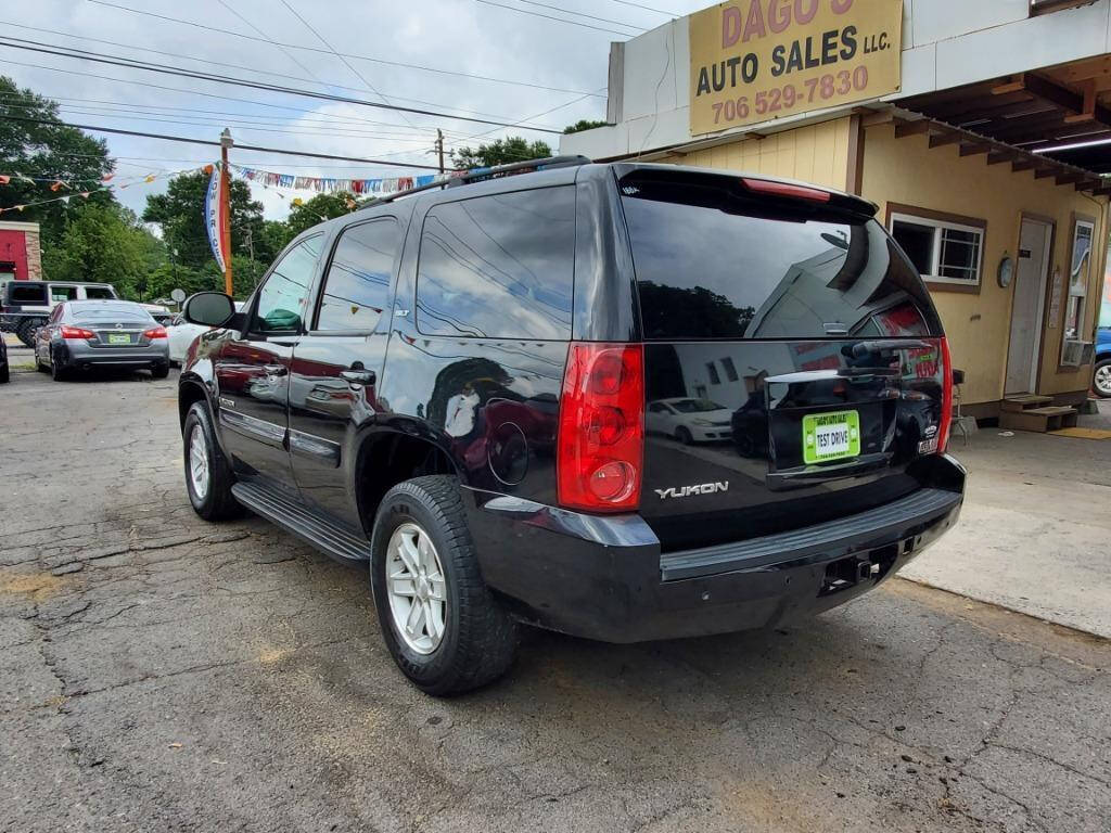 2008 GMC Yukon for sale at DAGO'S AUTO SALES LLC in Dalton, GA