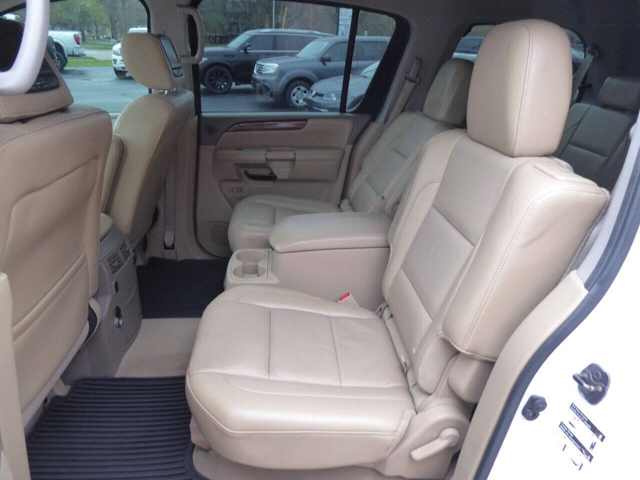 2013 Nissan Armada for sale at Lakeshore Autos in Holland, MI