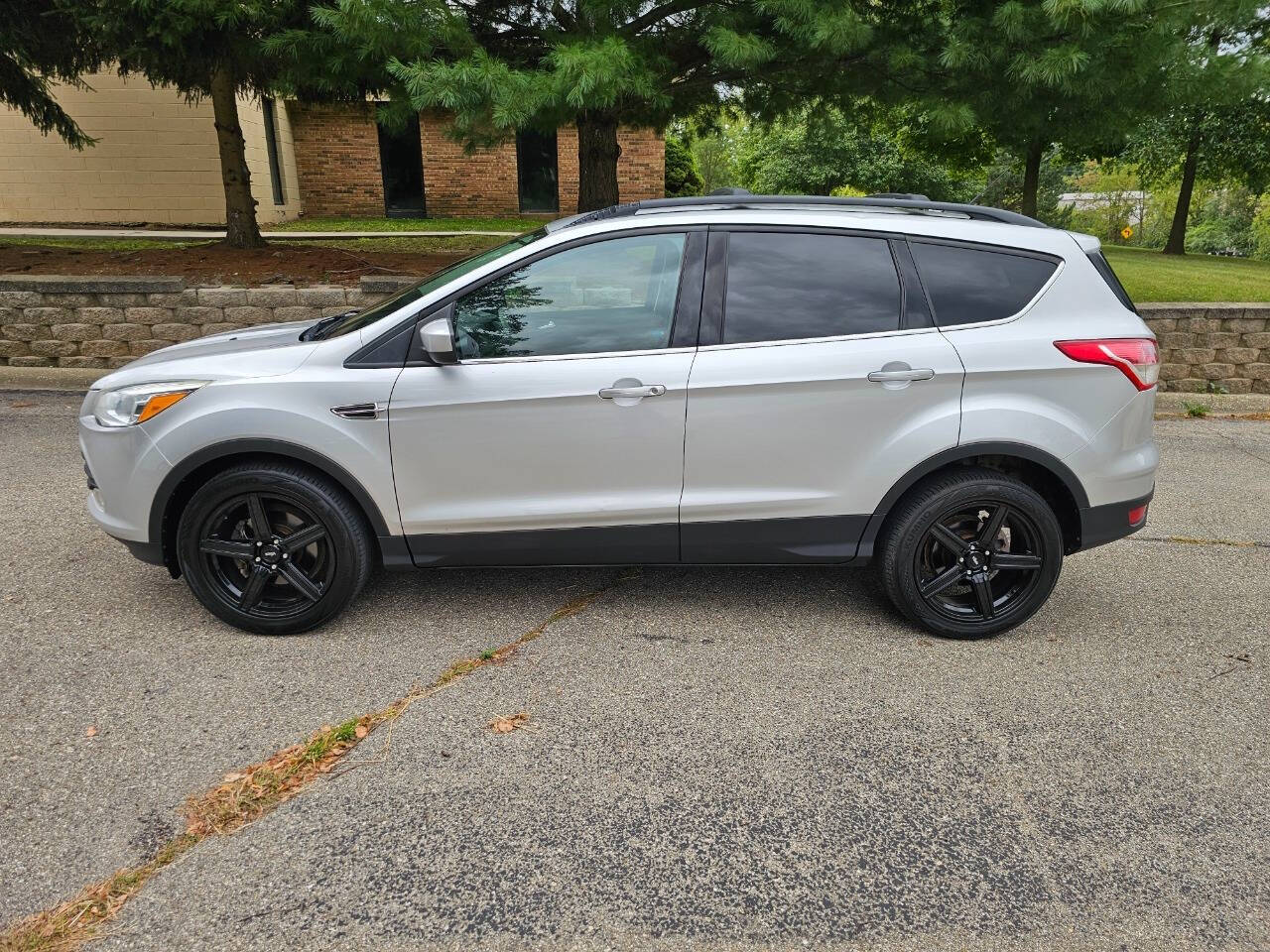 2013 Ford Escape for sale at WAGNER AUTO MART LLC in Ann Arbor, MI